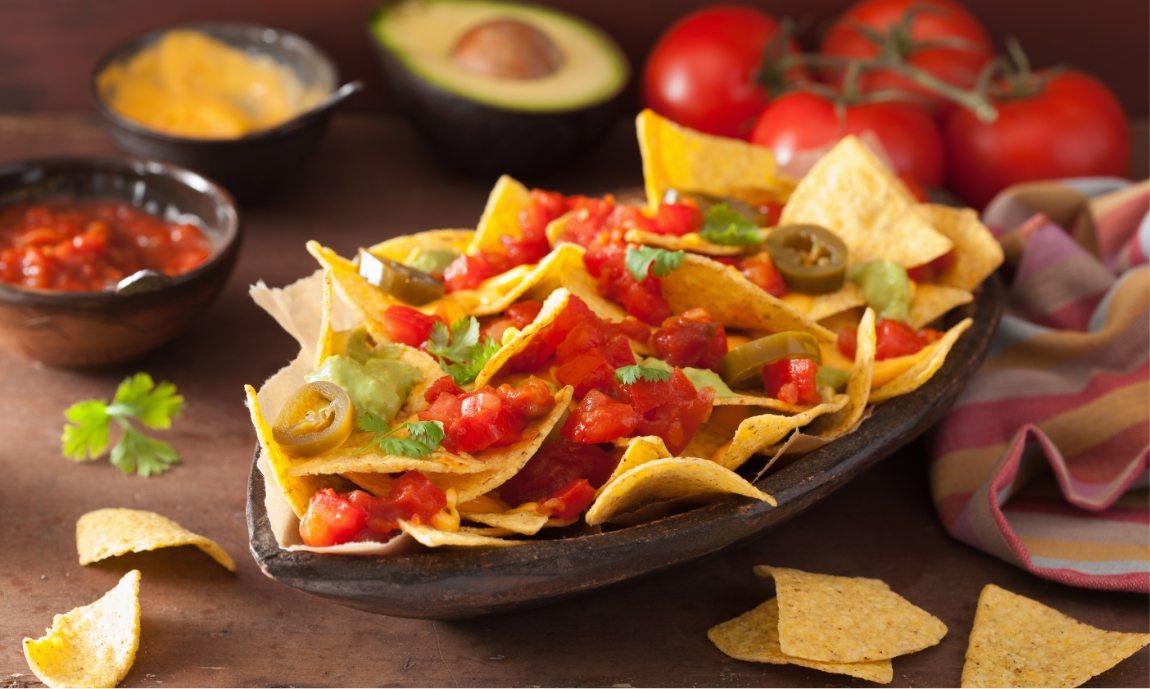 demo-attachment-1166-nachos-loaded-with-salsa-guacamole-cheese-and-P7GUFN7